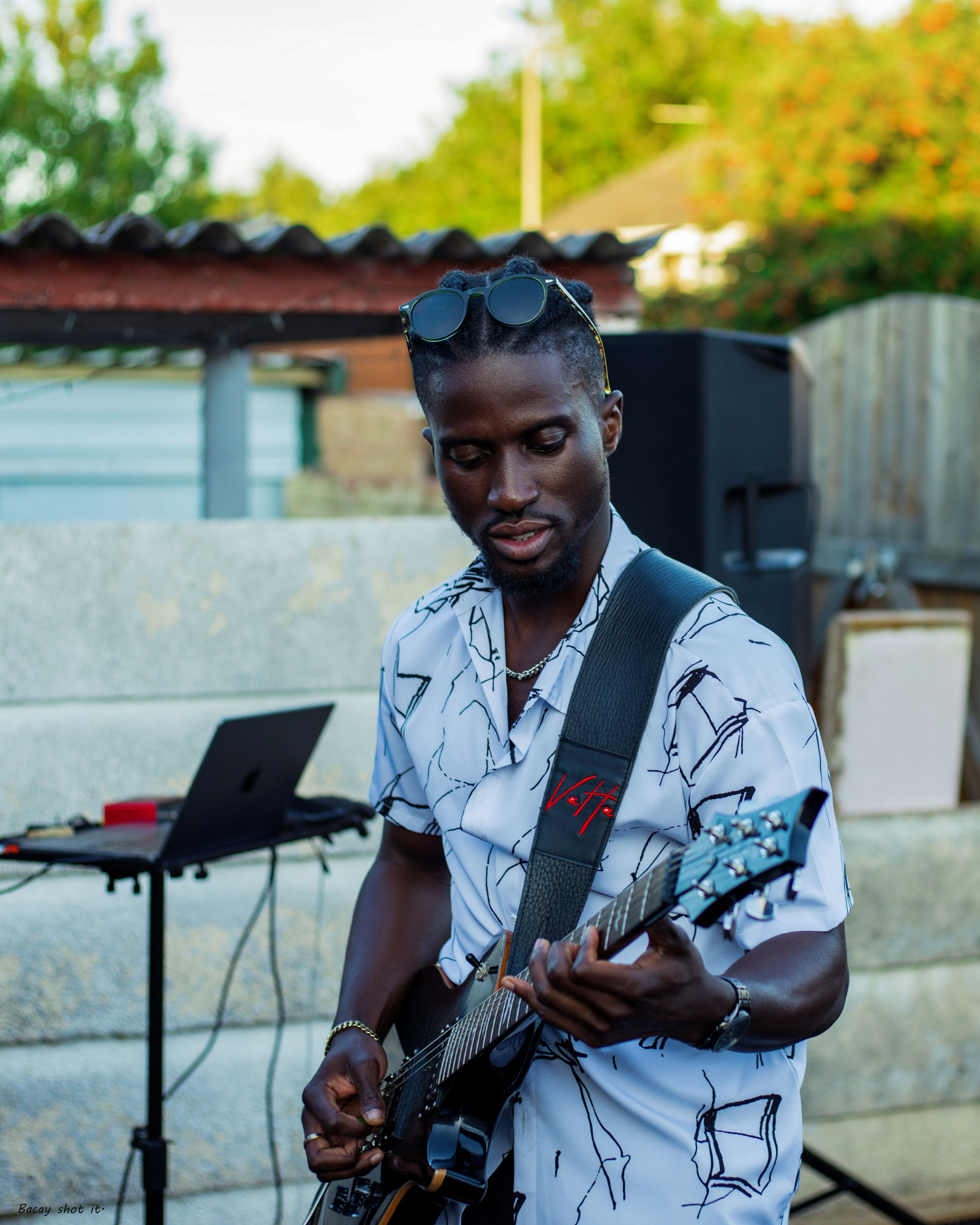 Band members on stage with professional lighting